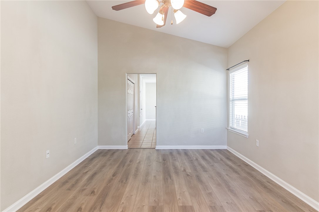 5625 Signal Point Austin, TX 78724 - Photo 3 of 28 Living room has vinyl flooring. Taken from front door.
