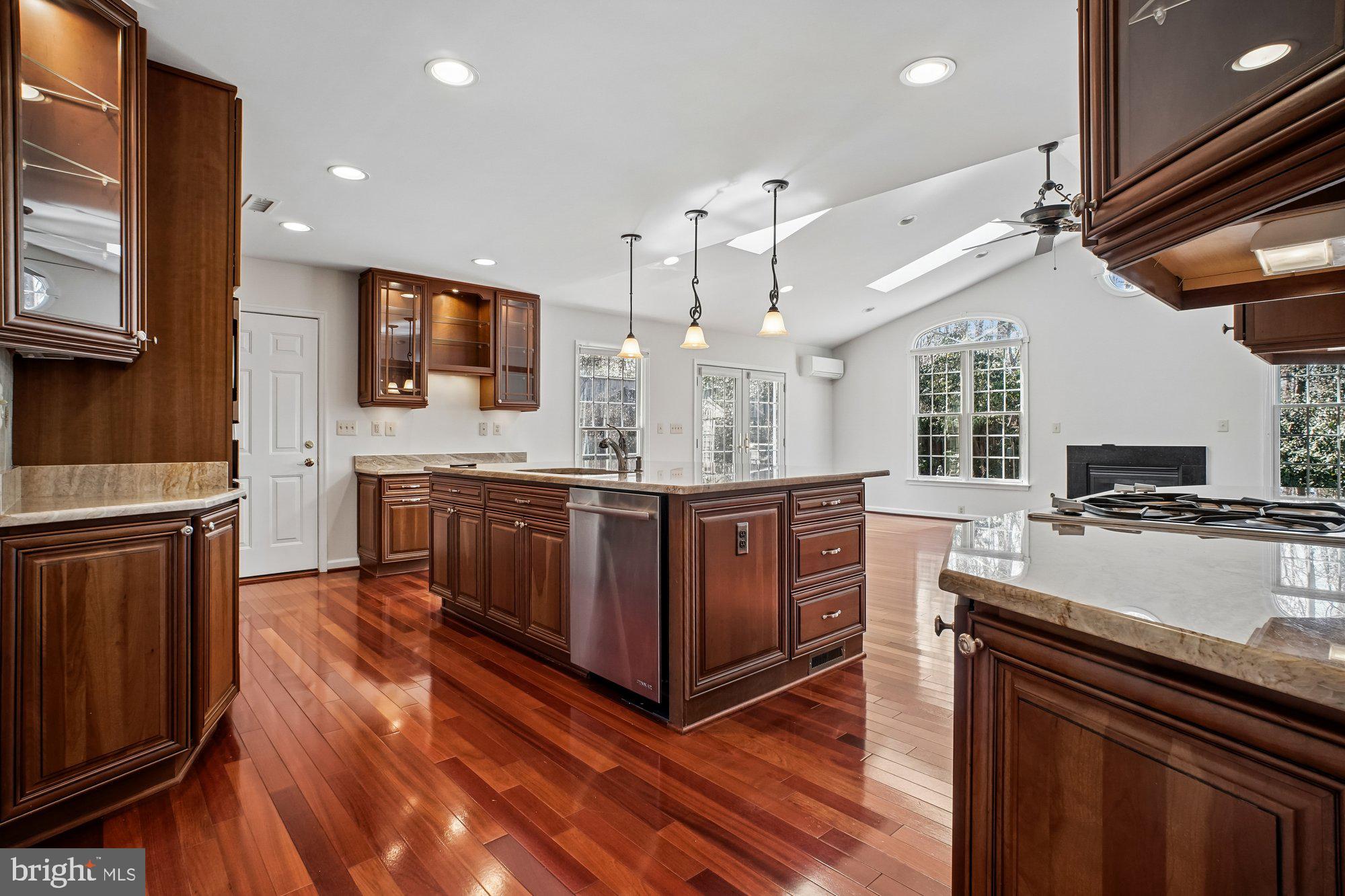 2126 Docket Lane Vienna, VA 22181 - Photo 16 of 63 a kitchen with stainless steel appliances granite countertop a stove and a sink
