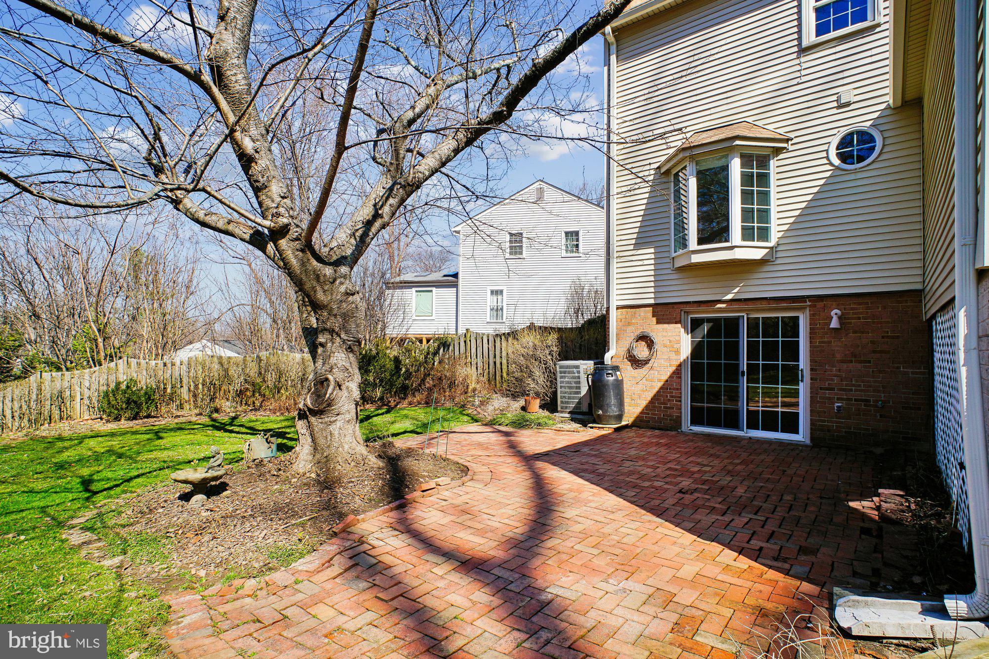 2126 Docket Lane Vienna, VA 22181 - Photo 49 of 63 a view of a house with backyard and sitting area