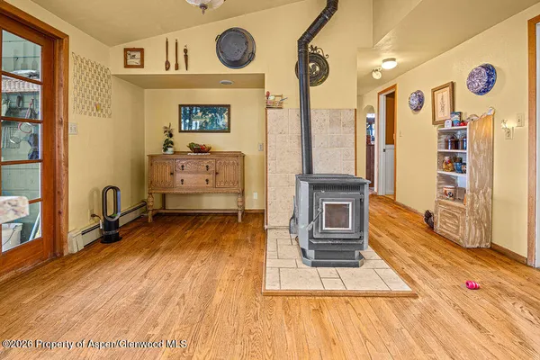 a outdoor dining area with chairs and tables