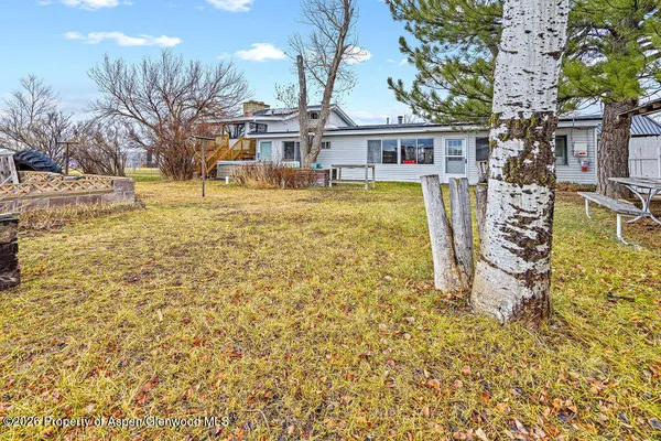 a view of a house with a swimming pool