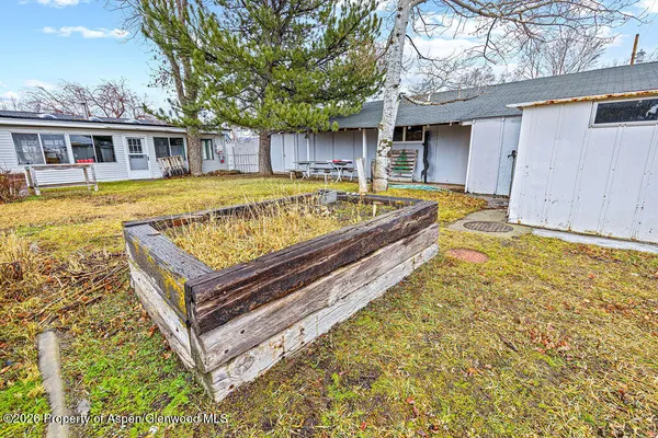 a view of swimming pool with a patio