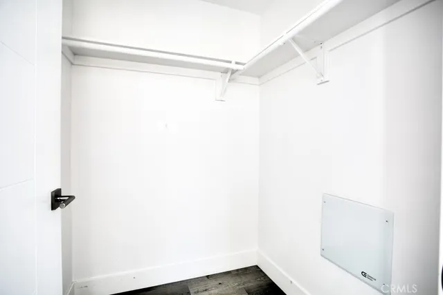 a view of small space with racks on the wall