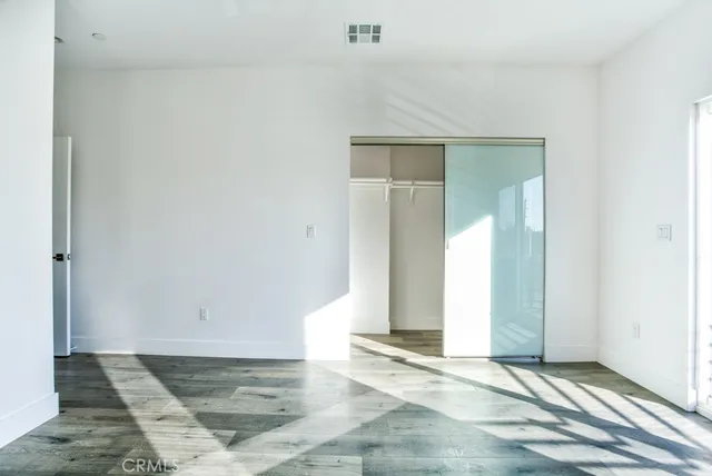 an empty room with a bench