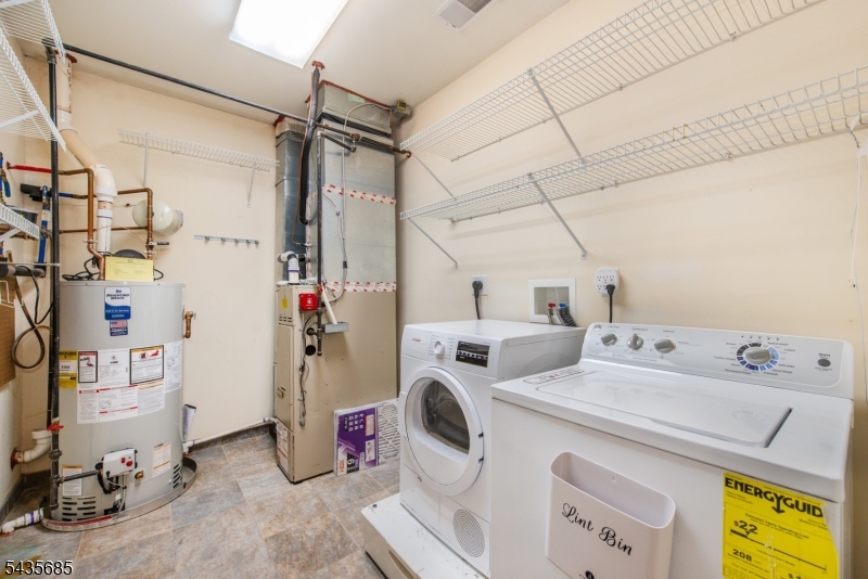 16 Main Street Sparta, NJ 07871 - Photo 28 of 33 a utility room with dryer and washer