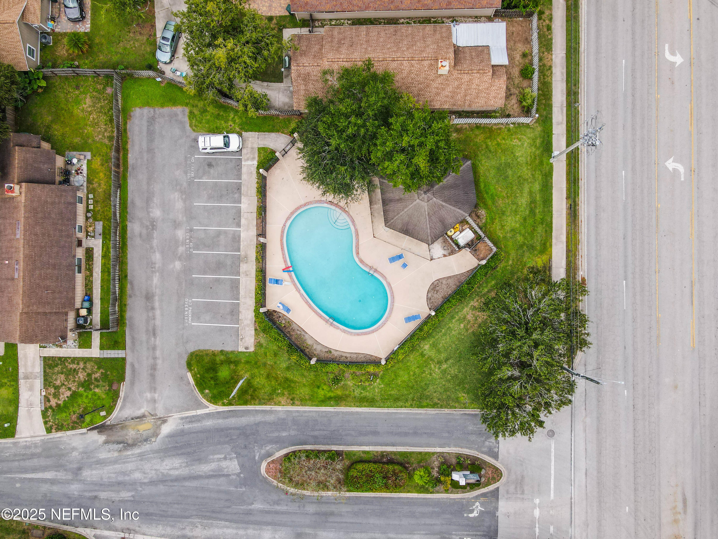 3801 Crown Point Road, Unit 3101 Jacksonville, FL 32257 - Photo 27 of 34 an aerial view of a house with garden space and street view