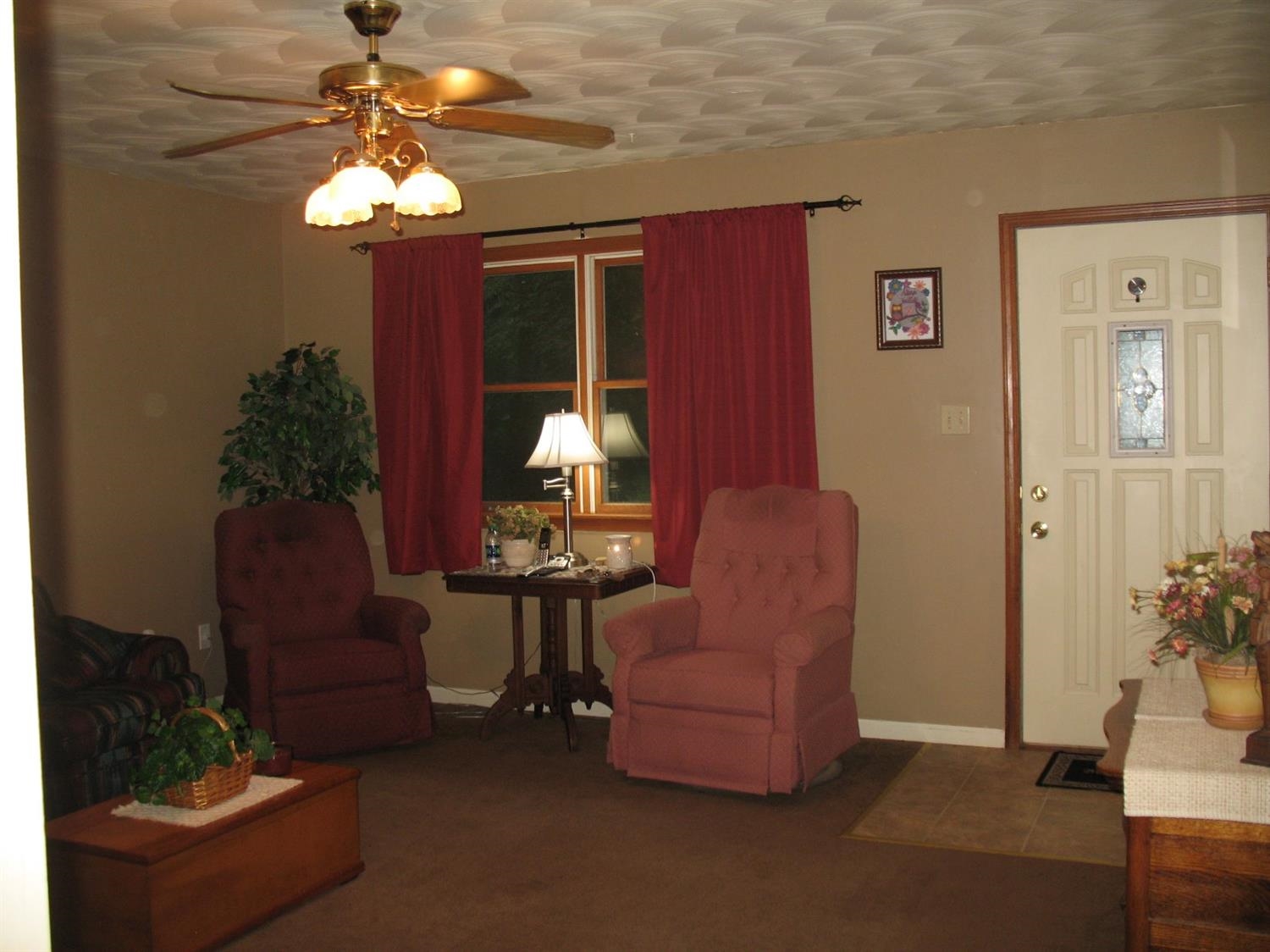 704-2 Juniper Road Valparaiso, IN 46385 - Photo 9 of 10 a living room with furniture and a chandelier