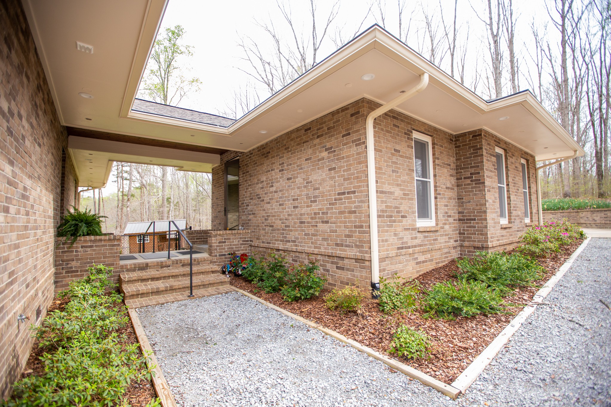 895 Sam Vineyard Road Bon Aqua, TN 37025 - Photo 12 of 60 a front view of a house with a yard