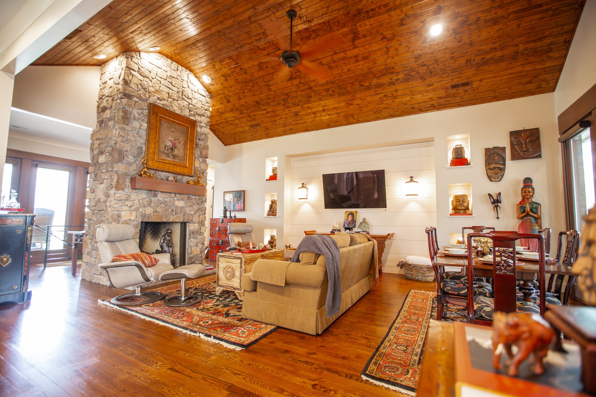 895 Sam Vineyard Road Bon Aqua, TN 37025 - Photo 23 of 60 a living room with furniture a fireplace and a flat screen tv
