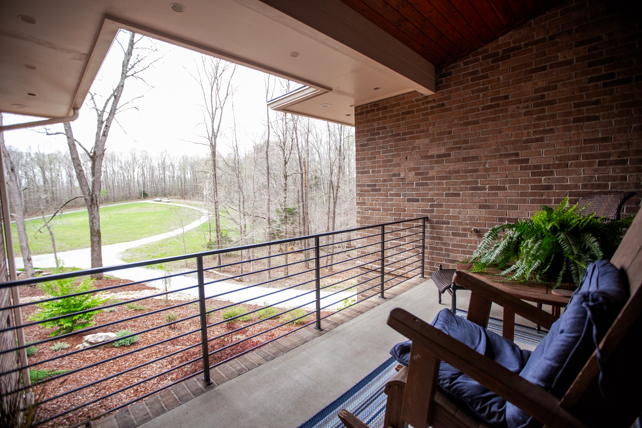 895 Sam Vineyard Road Bon Aqua, TN 37025 - Photo 32 of 60 a view of a two chair in the balcony