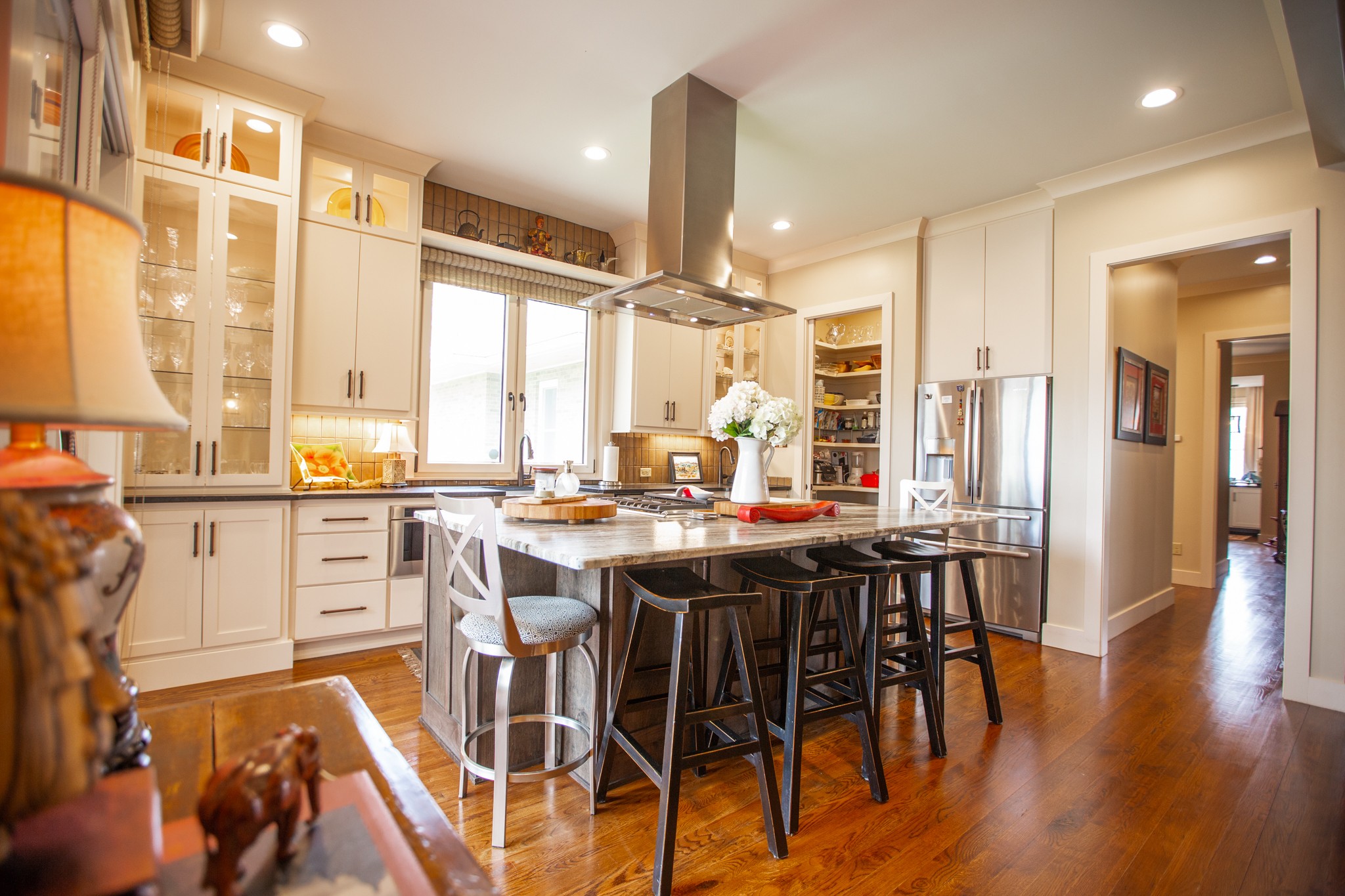 895 Sam Vineyard Road Bon Aqua, TN 37025 - Photo 36 of 60 a large kitchen with a table and chairs