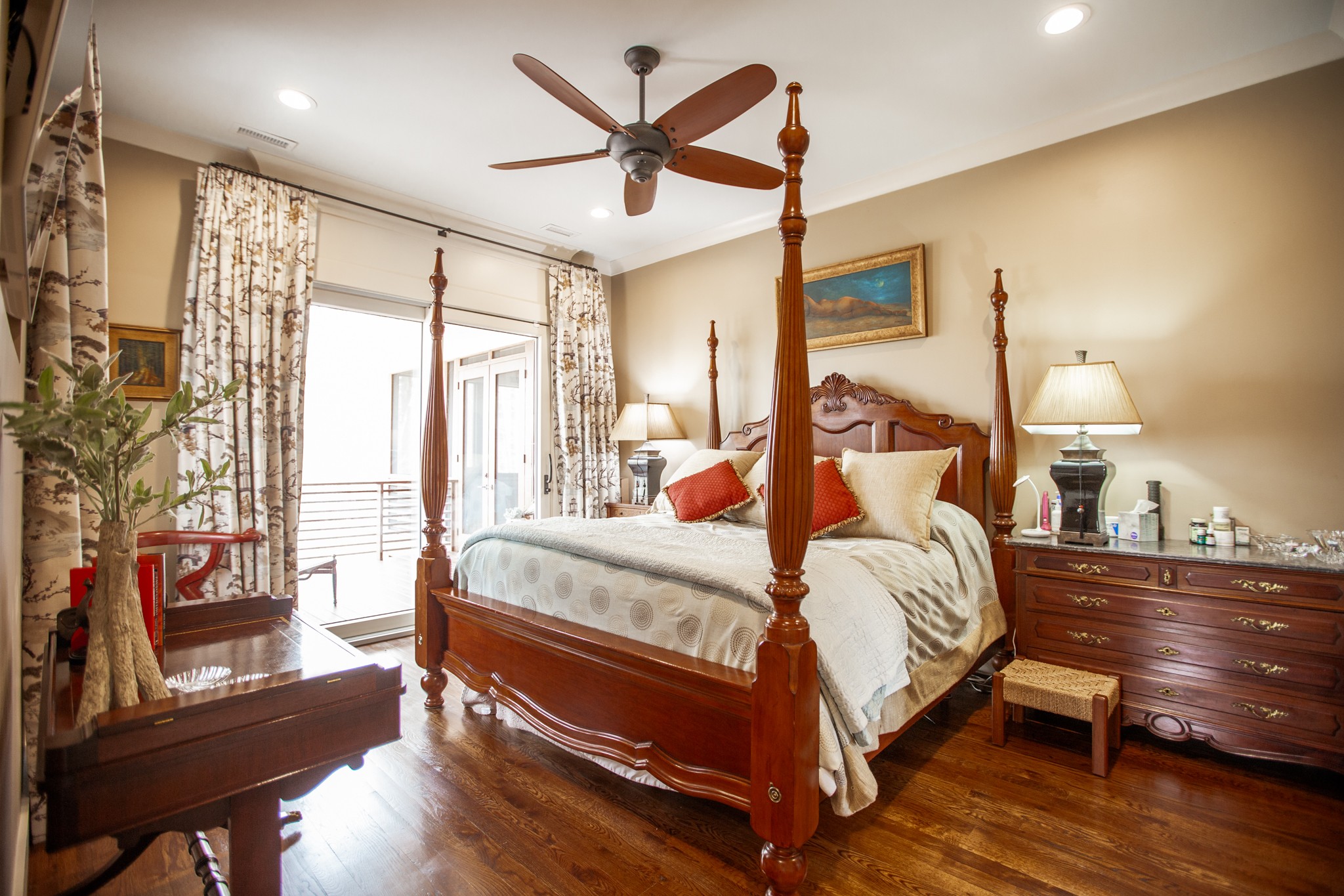 895 Sam Vineyard Road Bon Aqua, TN 37025 - Photo 46 of 60 a bedroom with a bed and wooden floor