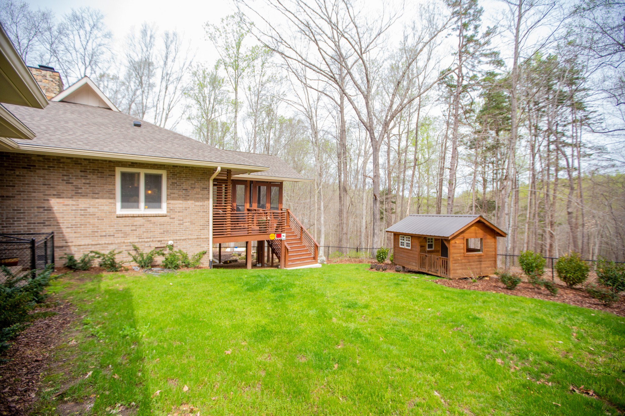 895 Sam Vineyard Road Bon Aqua, TN 37025 - Photo 9 of 60 a view of a house with a yard and sitting area