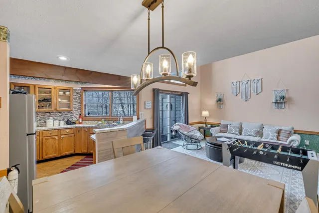a large room with chandelier fan