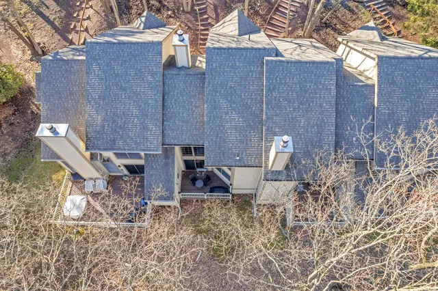 a view of roof with sitting area
