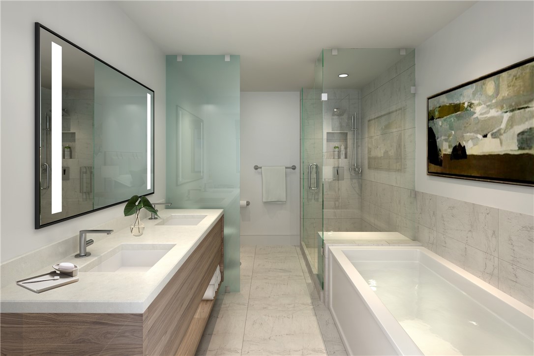 75 Hunki Dori Court, Unit W209 Keystone, CO 80435 - Photo 13 of 21 a bathroom with a tub a sink and mirror