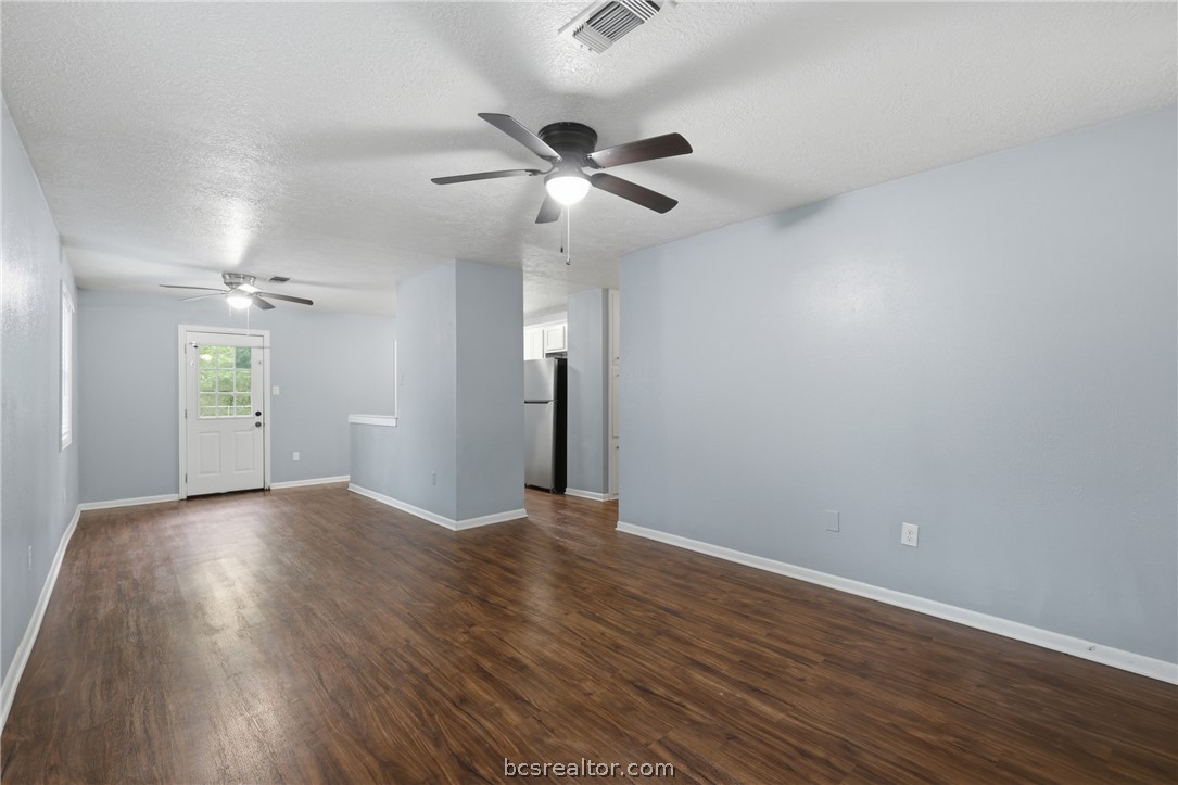 502 West 14th Street Bryan, TX 77803 - Photo 3 of 16 wooden floor in an empty room