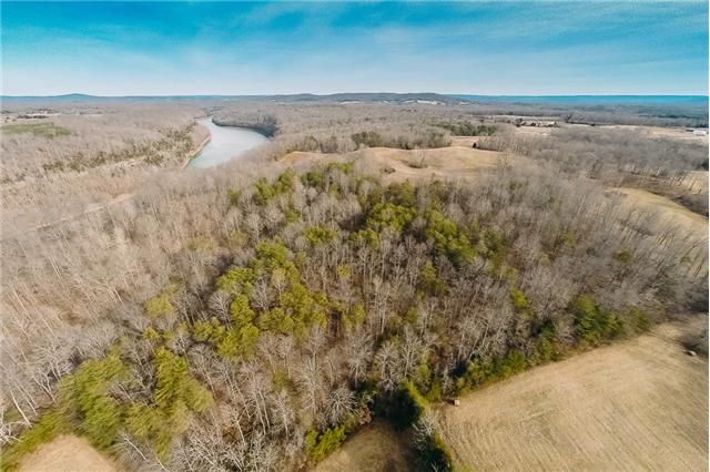0 Wright Bend Road Smithville, TN 37166 - Photo 1 of 14 Majestic timber lines the river! So much versatility here!