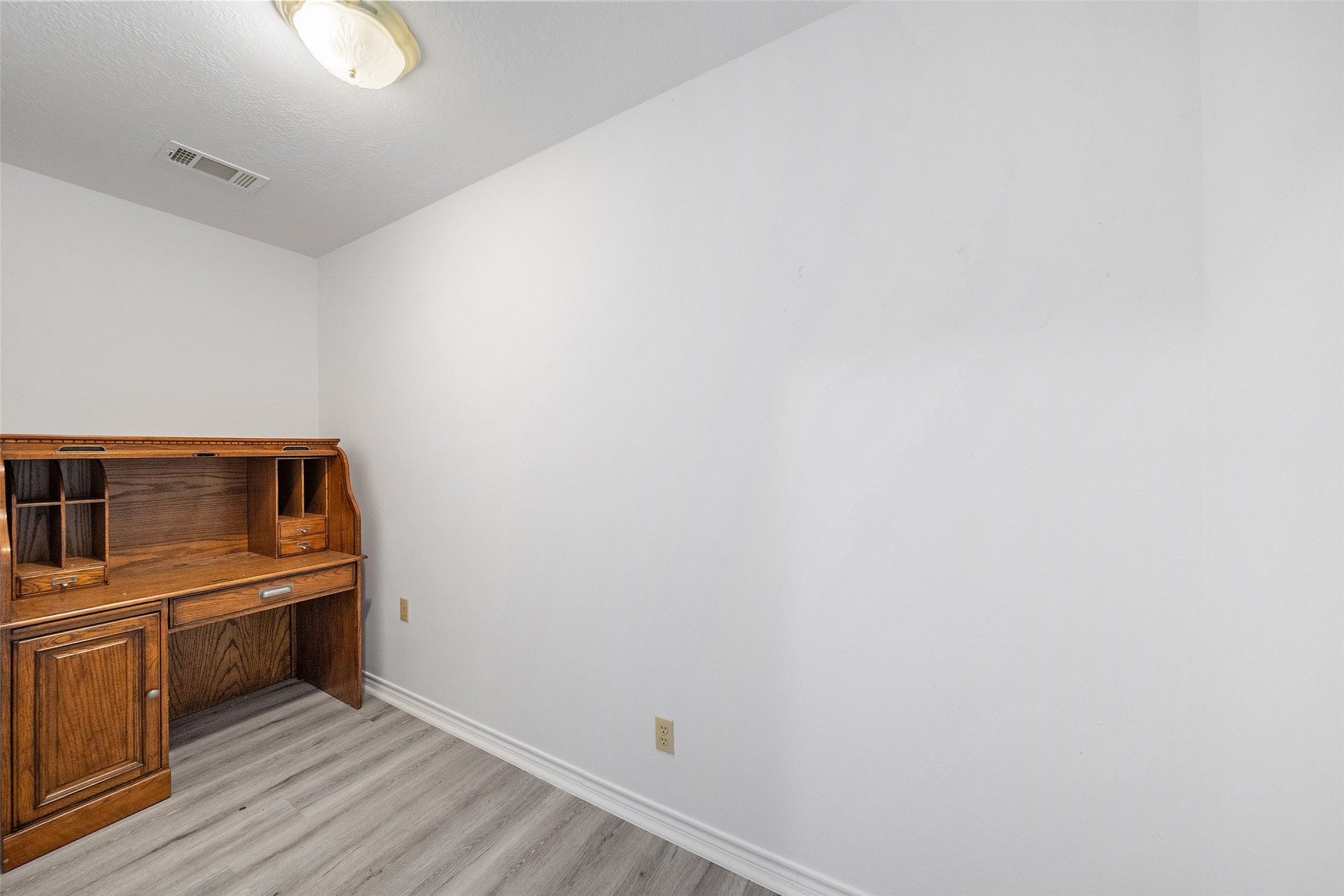 124 Timbo Trail Livingston, TX 77351 - Photo 16 of 45 a room with a stove and a microwave