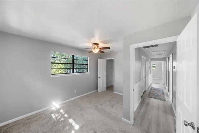 a view of a balcony with wooden floor