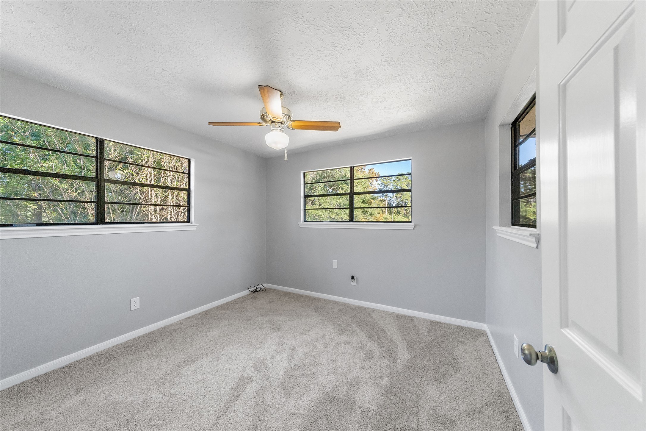 124 Timbo Trail Livingston, TX 77351 - Photo 21 of 45 a view of an empty room with a window