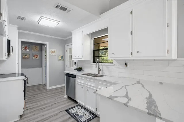 a view of a swimming pool with a patio