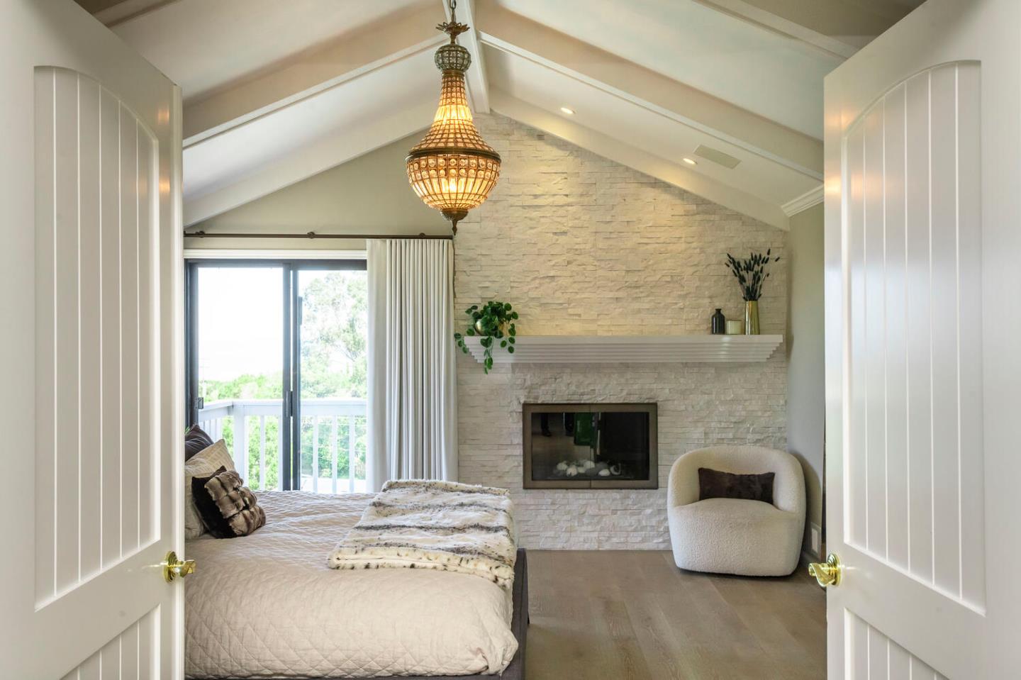 2651 Summit Drive Burlingame, CA 94010 - Photo 12 of 34 a living room with furniture chandelier and fireplace