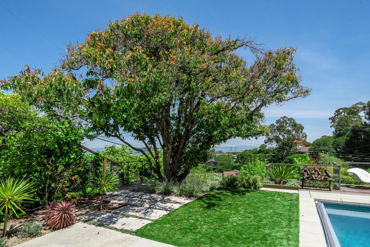 2651 Summit Drive Burlingame, CA 94010 - Photo 28 of 34 a view of a garden with plants and large trees