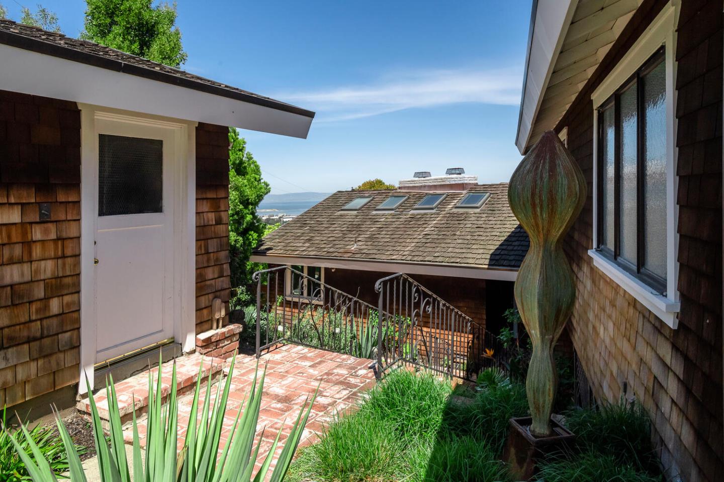 2651 Summit Drive Burlingame, CA 94010 - Photo 33 of 34 a view of house with backyard and garden