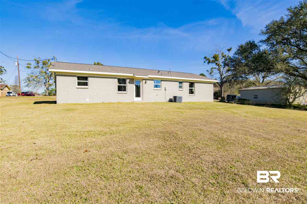 9141 Semmes Court Semmes, AL 36575 - Photo 23 of 28 Level back yard.
