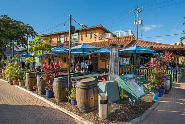 a view of a street with sitting area