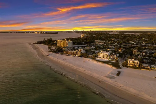 a view of an ocean and city
