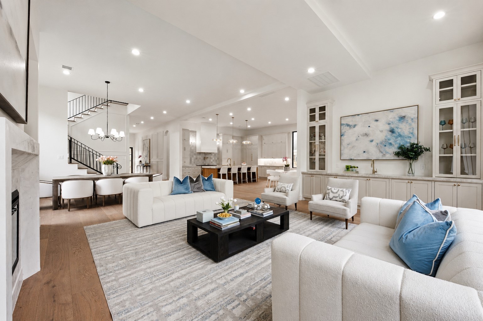 2325 Wroxton Road Houston, TX 77005 - Photo 10 of 34 Light filled living space with direct sight-lines into the dinning room, breakfast area and dinning room. Living room includes oversized wet bar perfect for entertainig