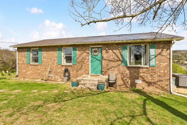 a view of a house with a patio
