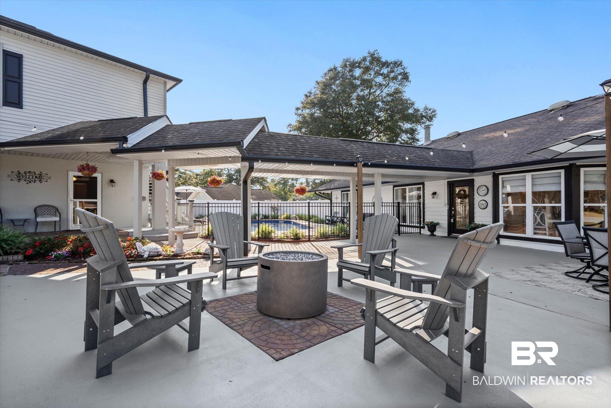 4567 Pine Avenue Saraland, AL 36571 - Photo 39 of 48 View of patio with an outdoor fire pit