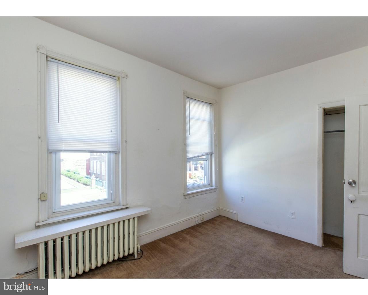 4359 Mitchell Street Philadelphia, PA 19128 - Photo 11 of 23 a view of an empty room with a window