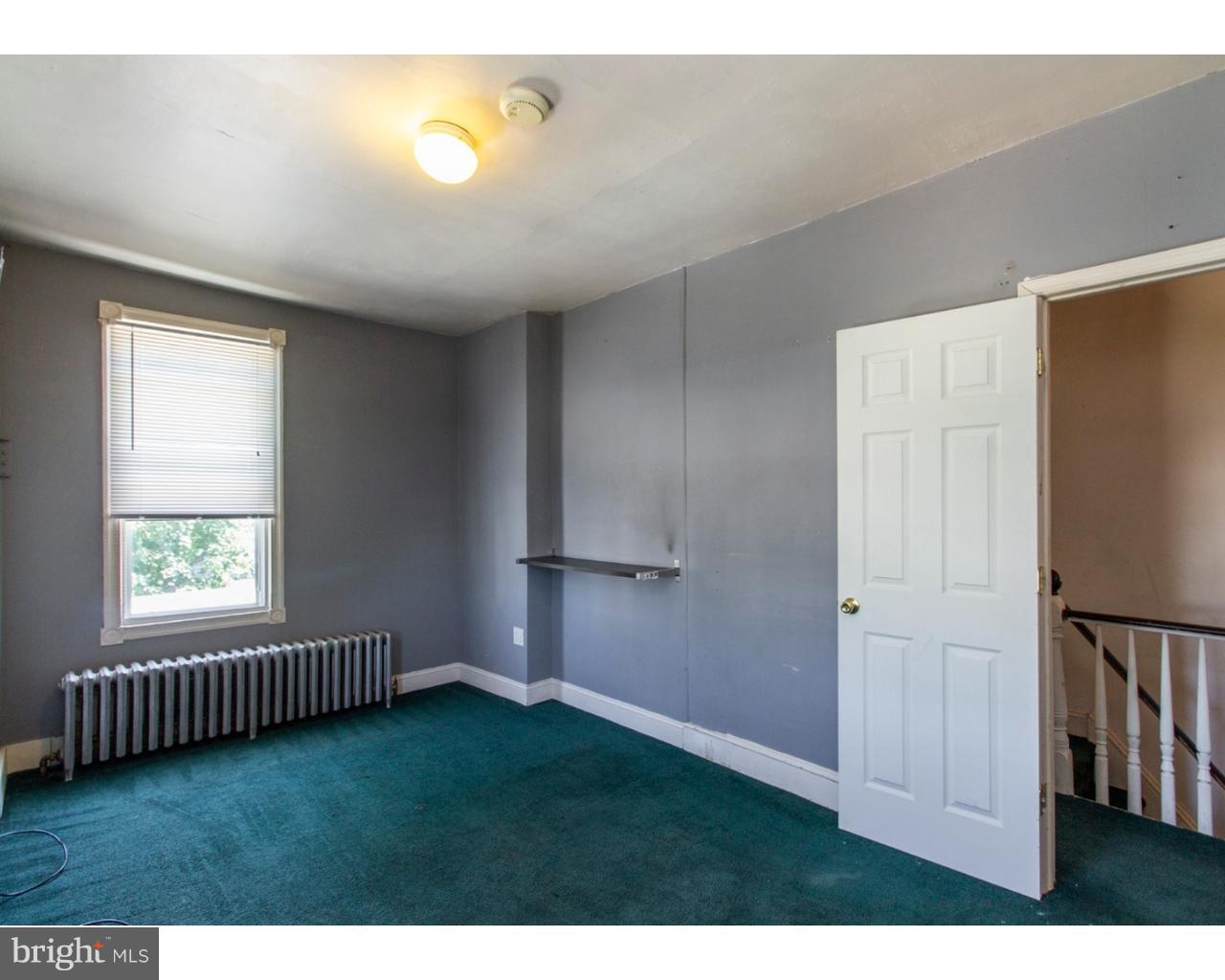 4359 Mitchell Street Philadelphia, PA 19128 - Photo 13 of 23 a view of an empty room with a window