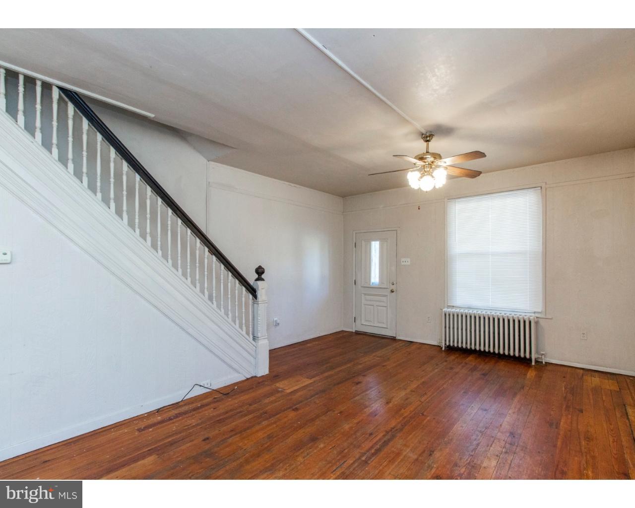 4359 Mitchell Street Philadelphia, PA 19128 - Photo 7 of 23 a view of an empty room with wooden floor