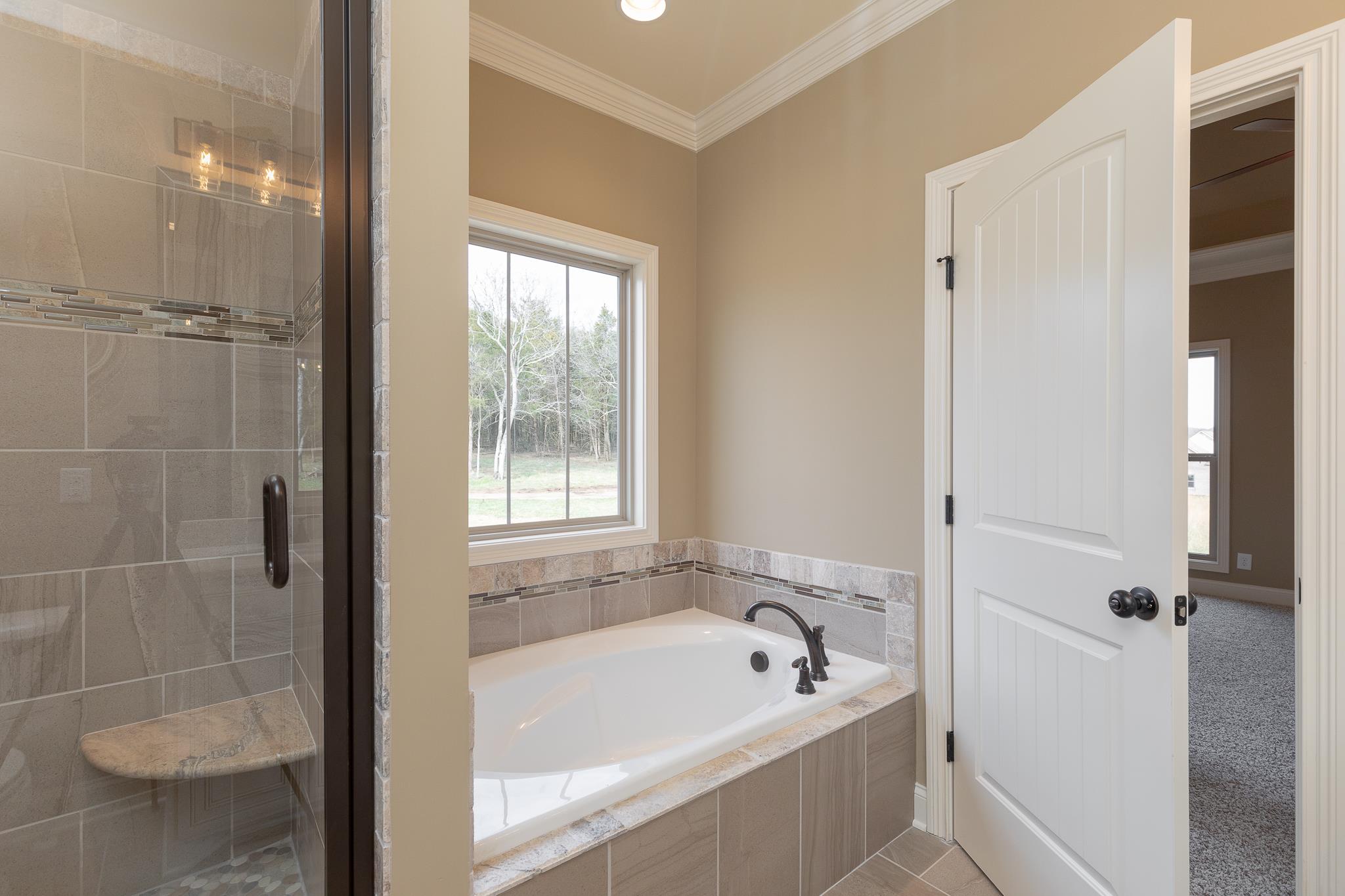1730 Dillon Road Milton, TN 37118 - Photo 22 of 30 a bathroom with a bathtub and shower