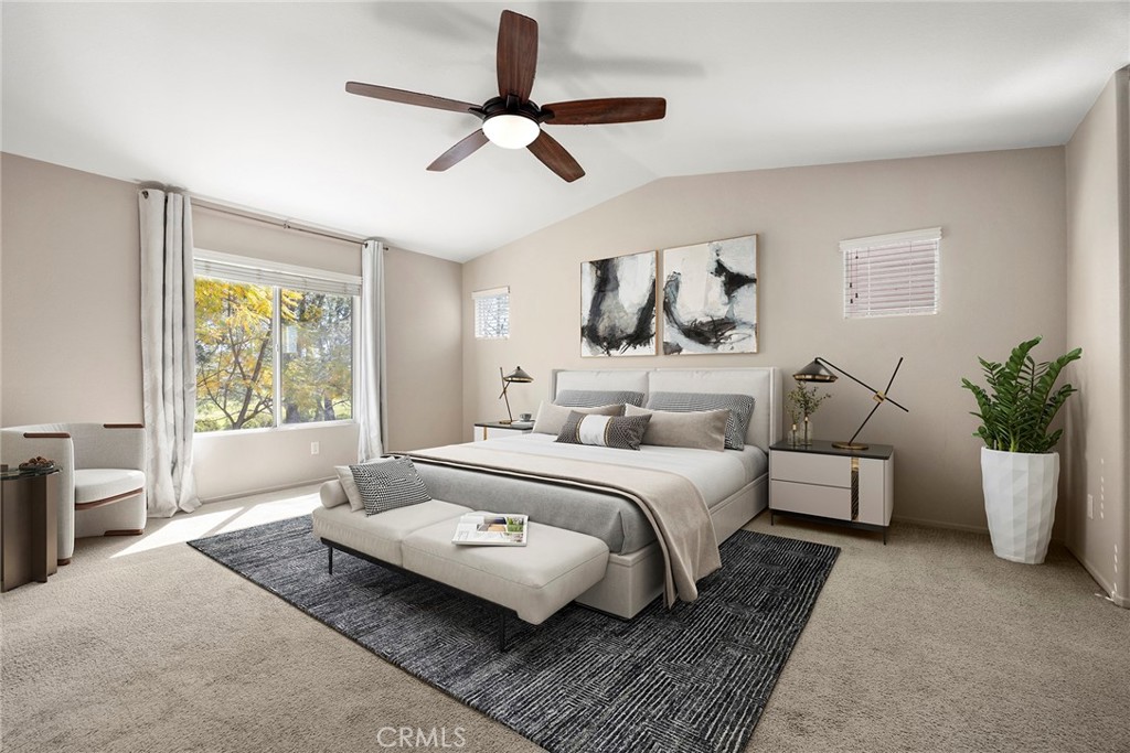 12351 Mesa Grove Drive Riverside, CA 92503 - Photo 11 of 32 a bedroom with a large bed and a window