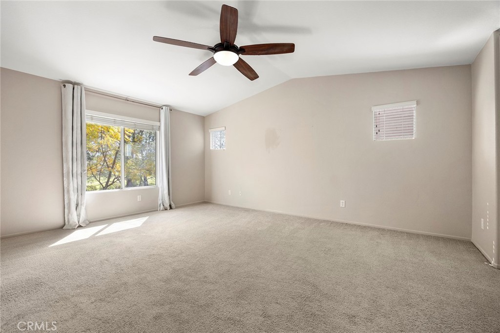 12351 Mesa Grove Drive Riverside, CA 92503 - Photo 12 of 32 an empty room with windows and fan view