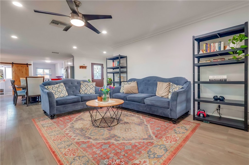 10937 Colima Road Whittier, CA 90604 - Photo 15 of 55 a living room with furniture and a large window
