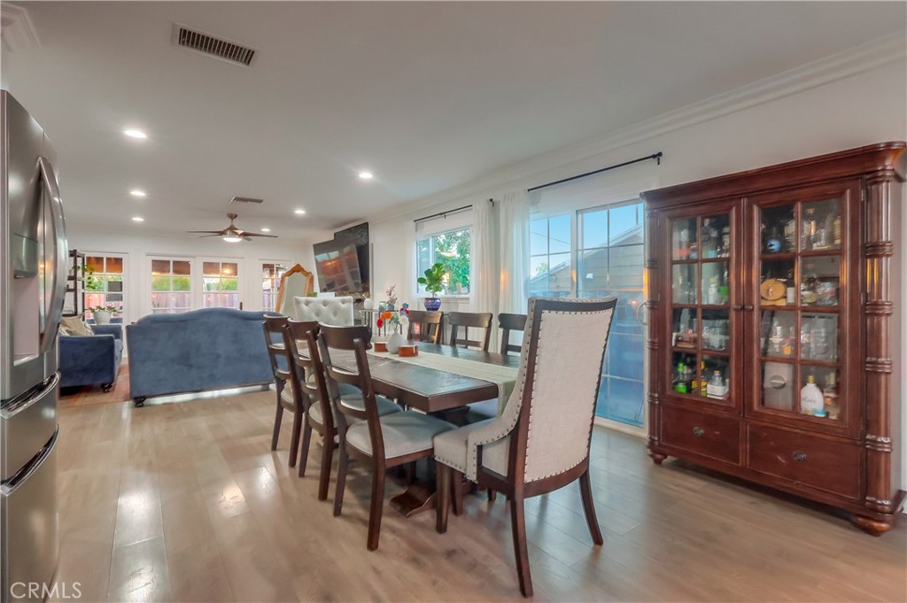 10937 Colima Road Whittier, CA 90604 - Photo 19 of 55 a view of a dining room with furniture window and wooden floor