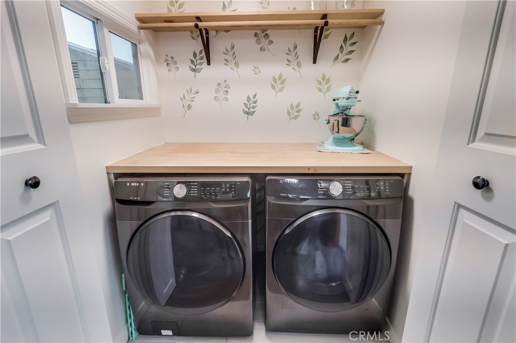 10937 Colima Road Whittier, CA 90604 - Photo 25 of 55 a utility room with dryer and washer