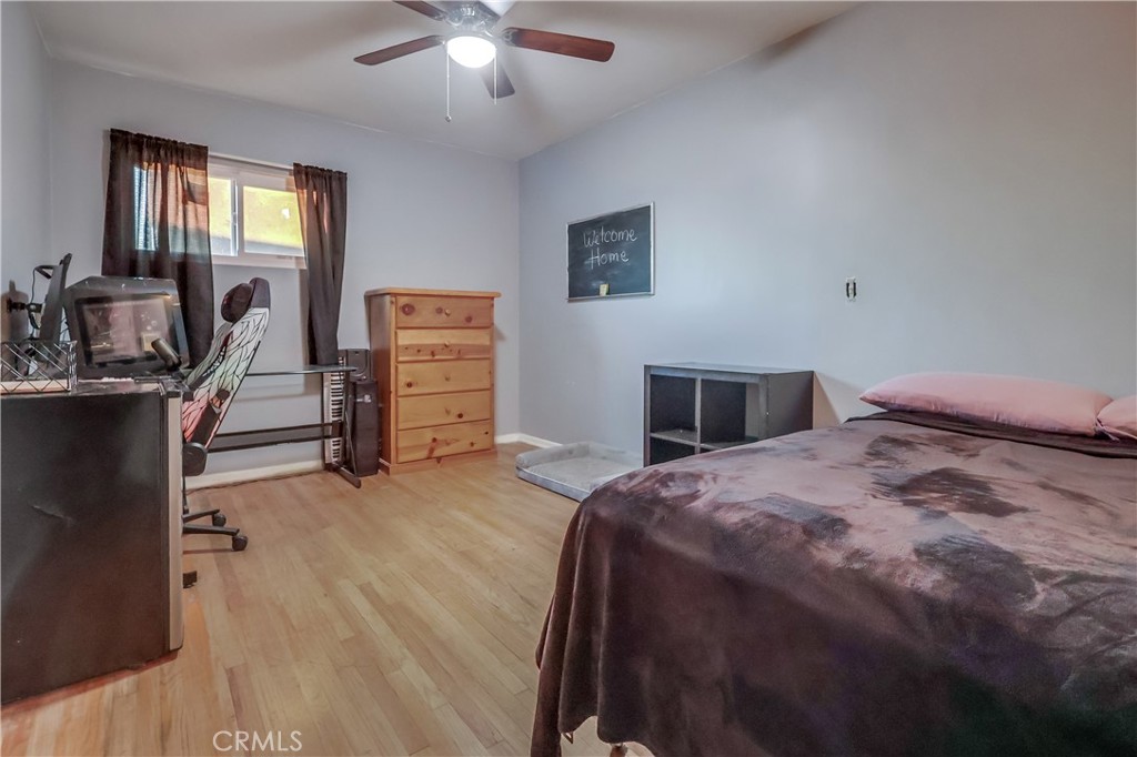 10937 Colima Road Whittier, CA 90604 - Photo 26 of 55 a bedroom with a bed and furniture