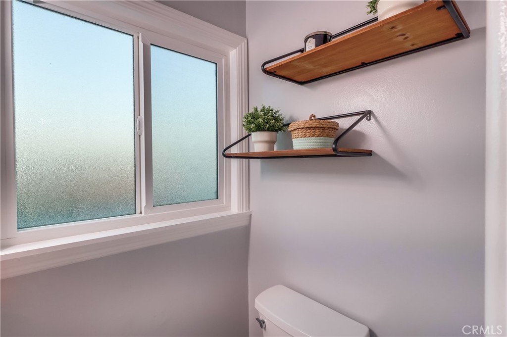 10937 Colima Road Whittier, CA 90604 - Photo 41 of 55 a bathroom with a sink and a mirror