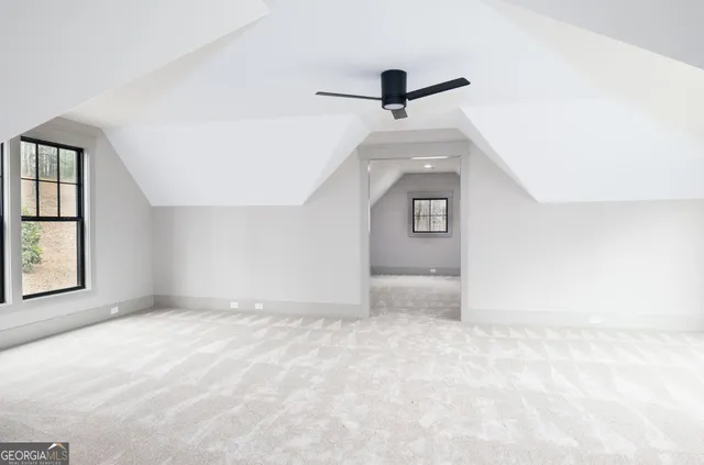 a view of a swimming pool with an ocean view