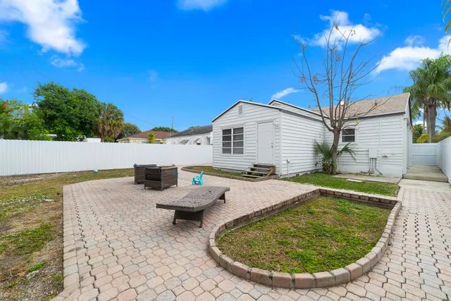 a view of a house with swimming pool