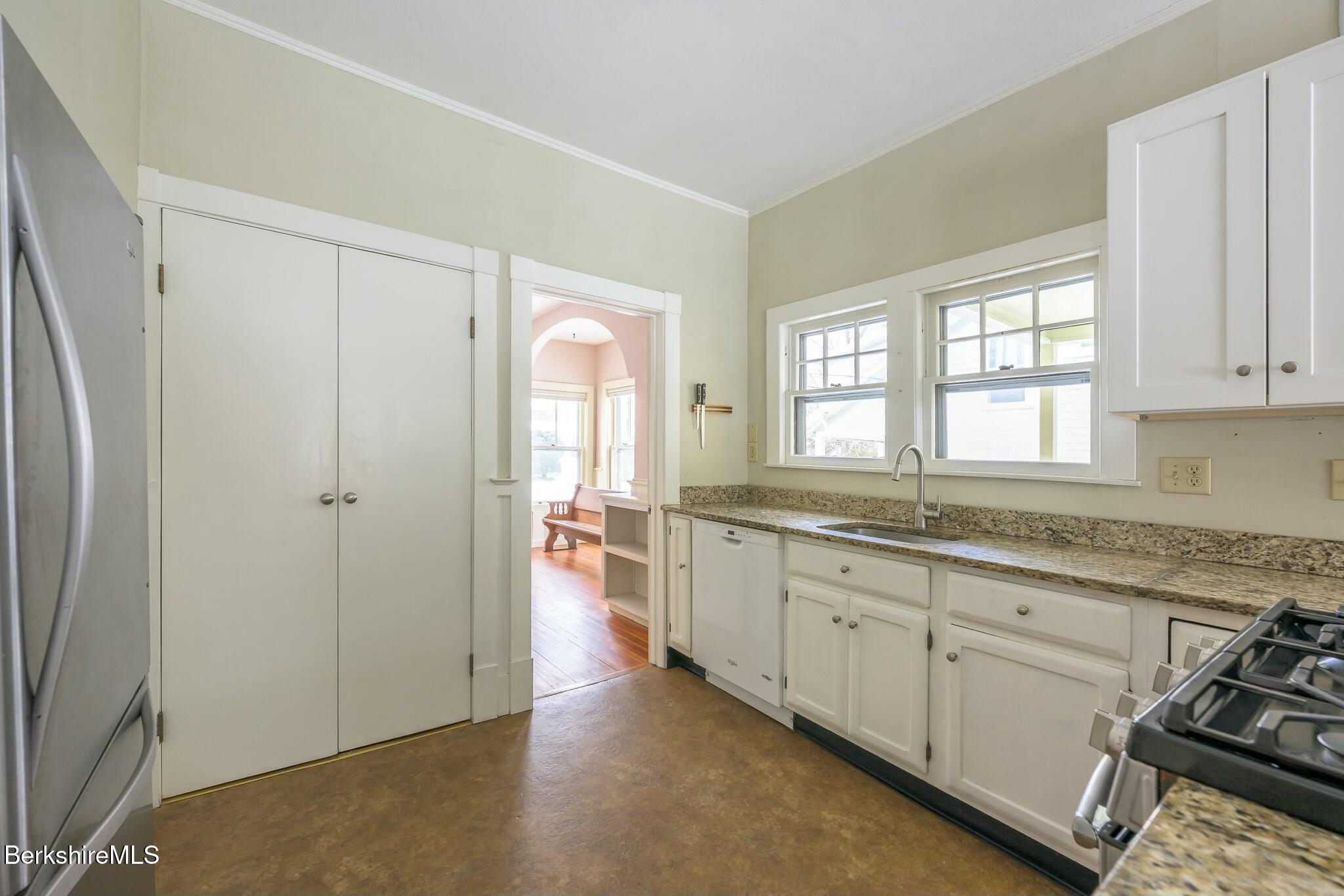 5 Stockbridge Road West Stockbridge, MA 01266 - Photo 22 of 60 a large bathroom with a granite countertop double vanity sink a mirror and a bathtub