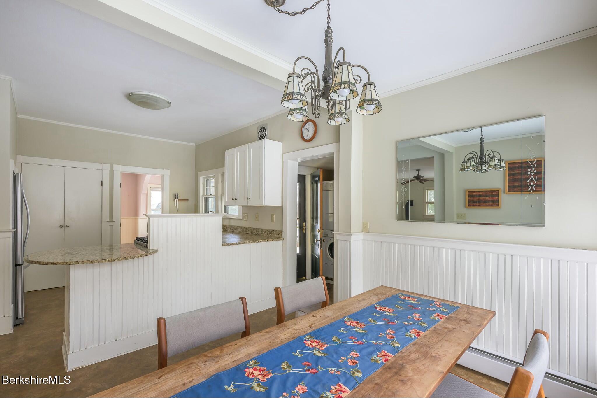 5 Stockbridge Road West Stockbridge, MA 01266 - Photo 24 of 60 a bedroom with furniture and a chandelier